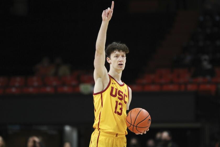 USC's Drew Peterson handles the ball against Oregon State on Feb. 24, 2022.