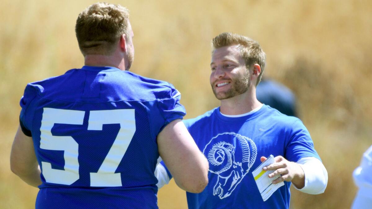 Rams Coach Sean McVay greets offensive lineman Christopher Watt (57) at rookie minicamp on May 12 at the team's practice facility in Thousand Oaks.