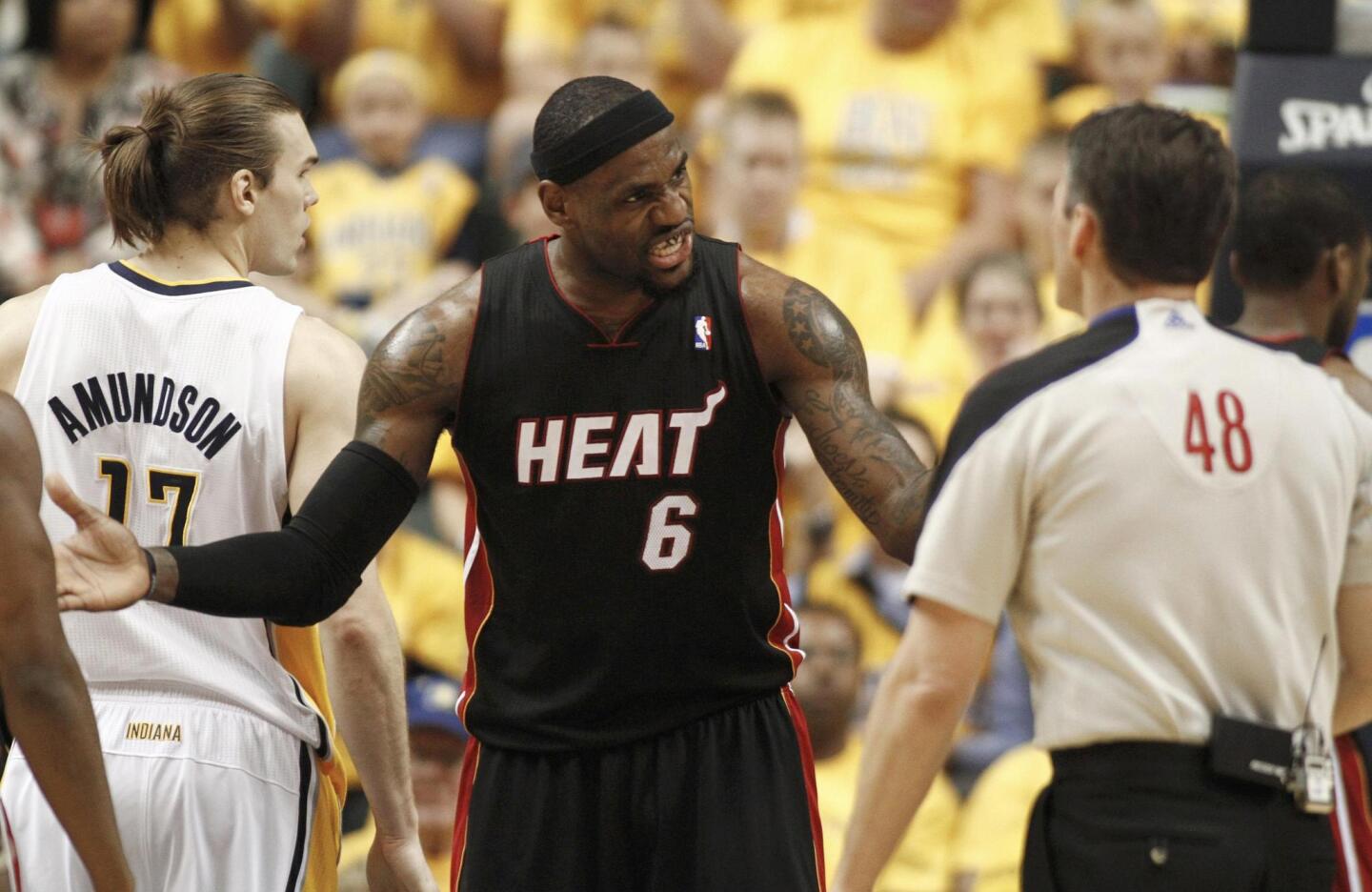 Miami Heat James argues with an official during the second quarter of Game 6 of their NBA Eastern Conference second round basketball playoff series against the Indiana Pacers in Indianapolis