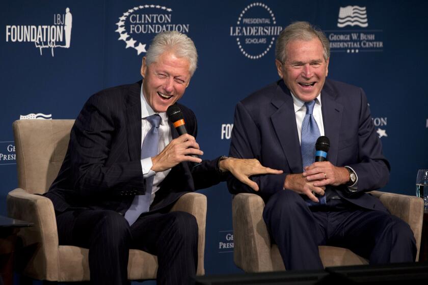 Former Presidents Bill Clinton and George W. Bush at the Newseum in Washington last year. The 2016 election could put yet another Bush or Clinton in the White House.