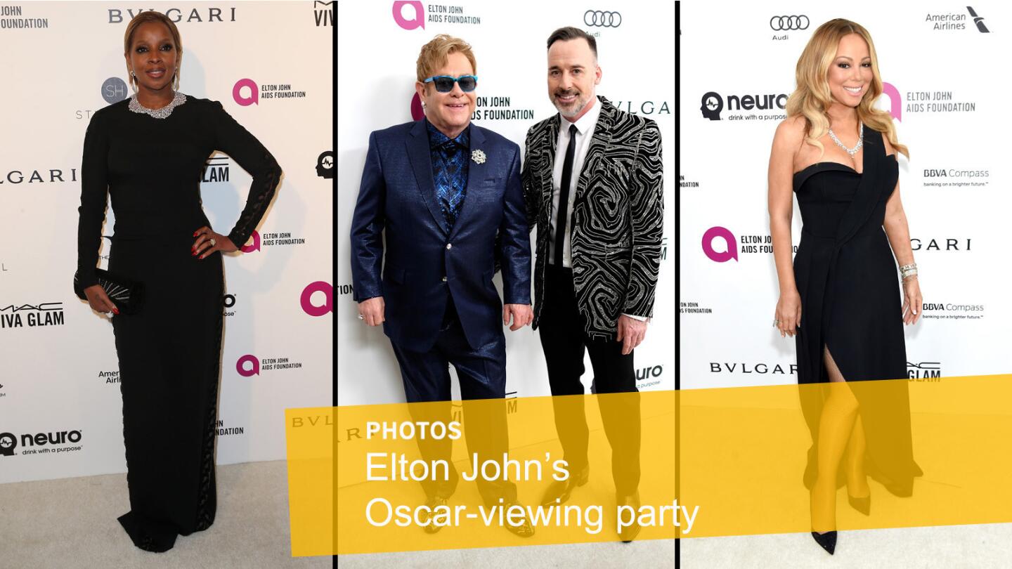 Guests arrive at the Elton John AIDS Foundation's Oscar-viewing party on Sunday. From left: Mary J. Blige; Elton John and David Furnish; and Mariah Carey.