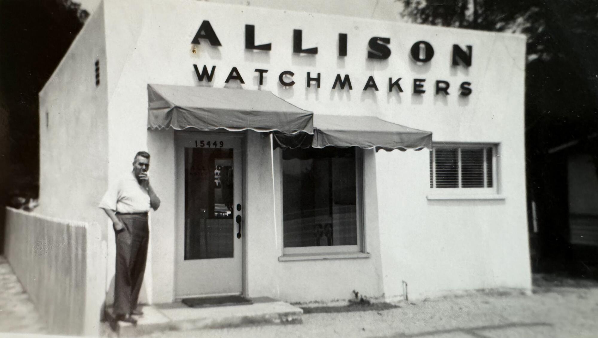 Undated photo of Charles Allison in front of the Allison Watchmakers storefront.