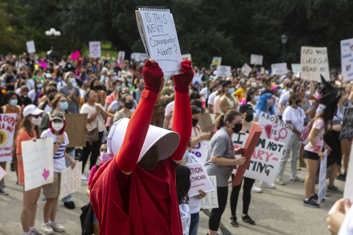 Abortion-rights supporters take part in the Women's March ATX rally in Austin, Texas, on Oct. 2.