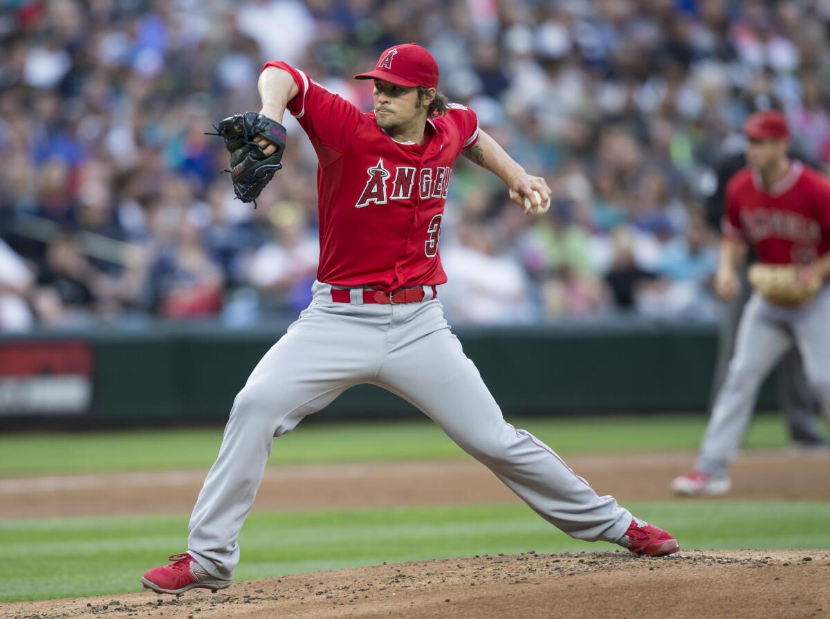 Angels starter C.J. Wilson gave up three runs and five hits in 6 2/3 innings against Seattle on Saturday night.