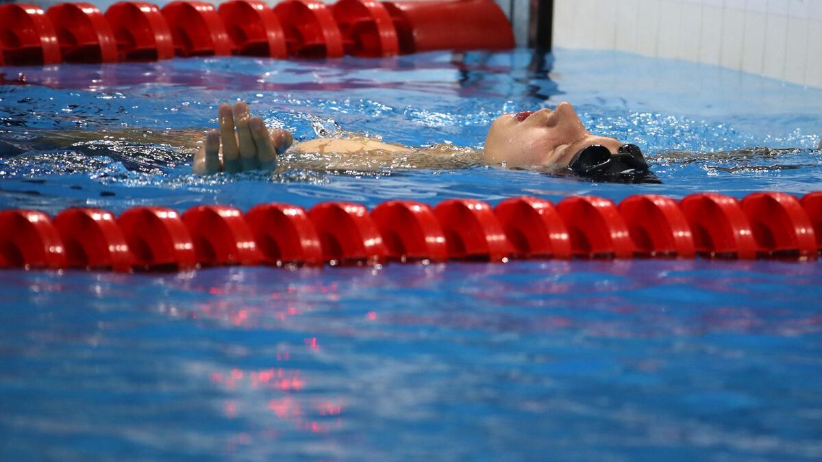 Chase Kalisz floats in the pool after finishing second in the 400-meter individual medley on Saturday night.