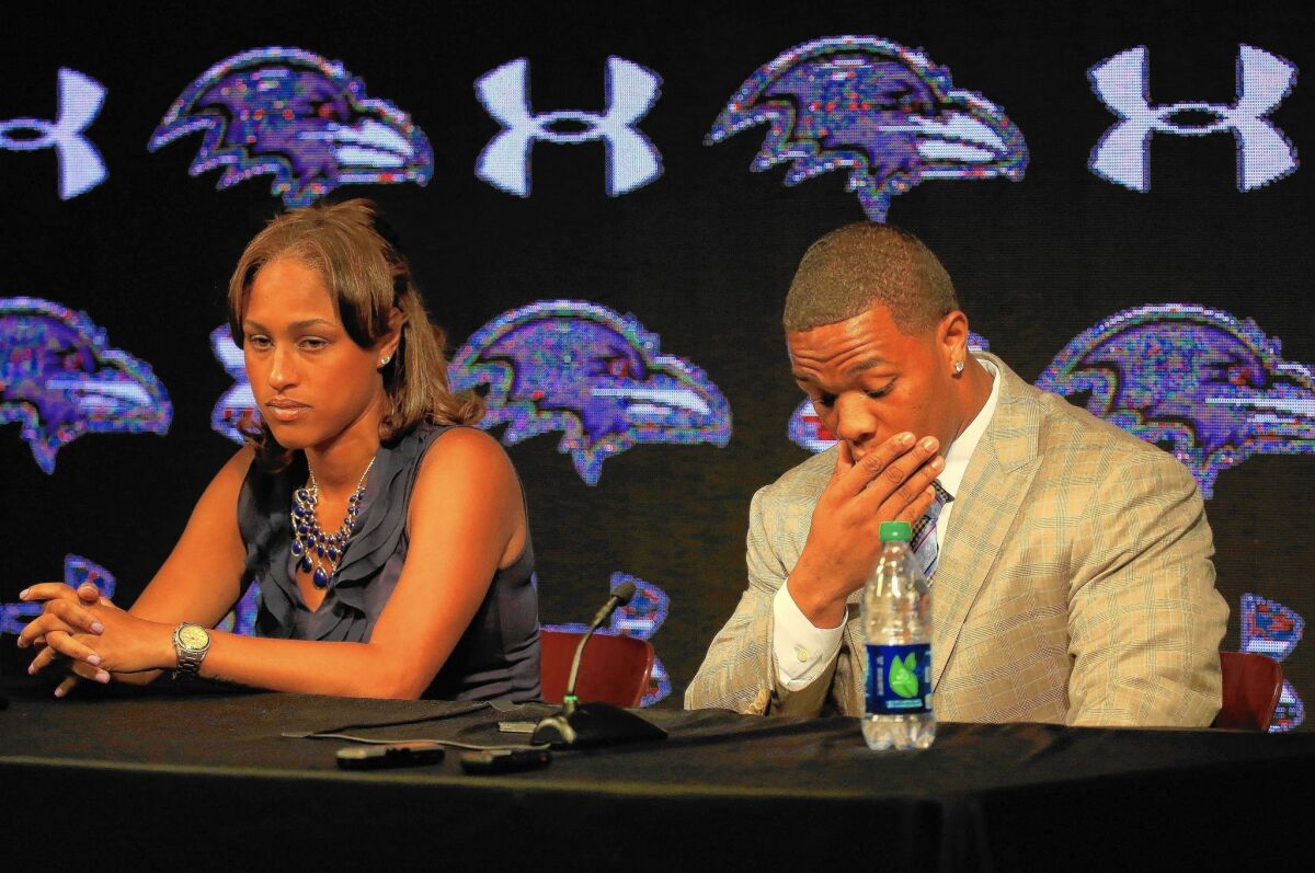 Baltimore Ravens running back Ray Rice pauses during a May 23 news conference with his wife, Janay Rice, whom he is accused of assaulting at a casino in February when they were engaged.