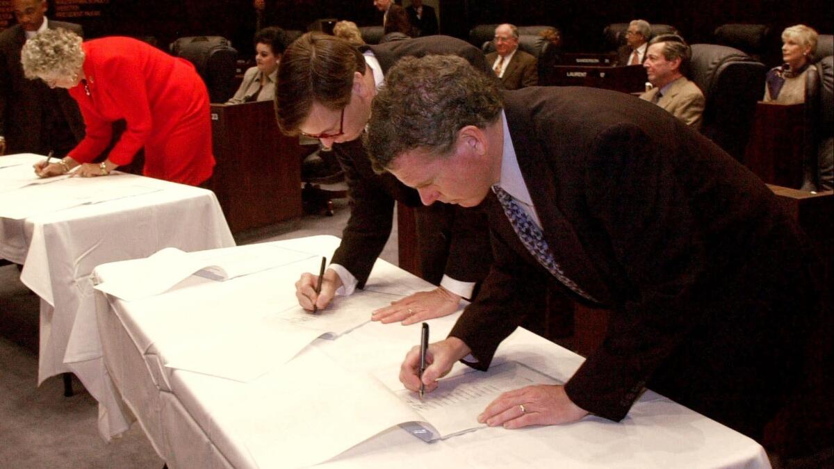 Florida electoral college members certify their votes for President-elect Bush on Dec. 18, 2000, in Tallahassee, Fla.