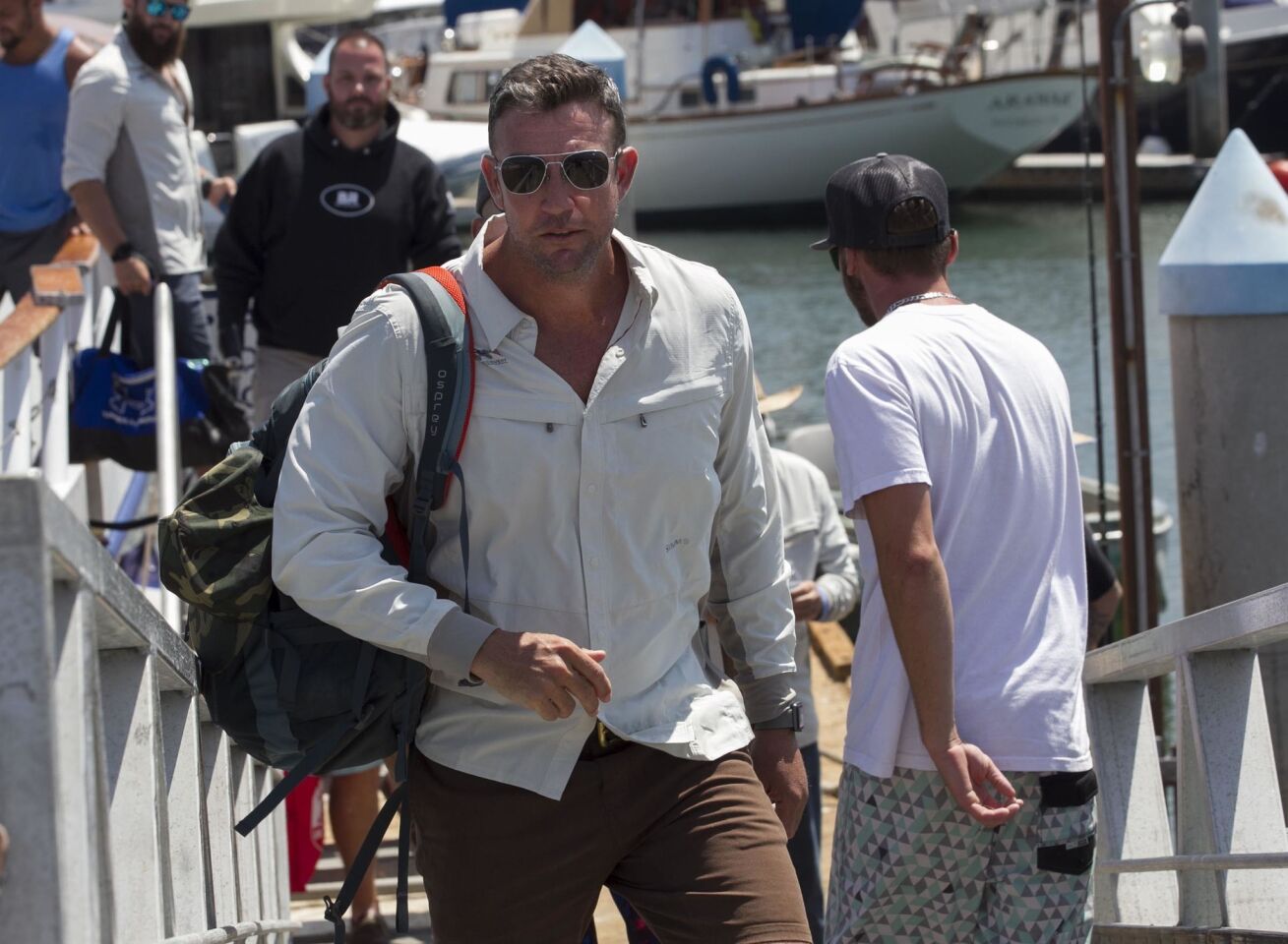 Congressman Duncan D. Hunter, who was indicted yesterday on campaign finance violations walked up the the dock from the fishing boat Dolphin after returning from a Rivers of Recovery Fishing Tournament for Wounded Combat Veterans fundraiser in San Diego.