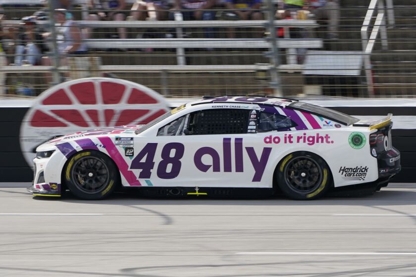 Alex Bowman (48) drives during the NASCAR Cup Series auto race at Texas Motor Speedway in Fort Worth, Texas, Sunday, Sept. 25, 2022. (AP Photo/Larry Papke)