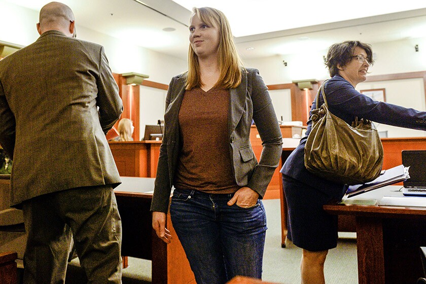 Tilli Buchanan, center, was charged in February with three counts of misdemeanor lewdness involving a child.