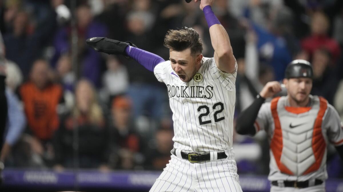 Rockies beat Giants as teams combined to use MLB record 25