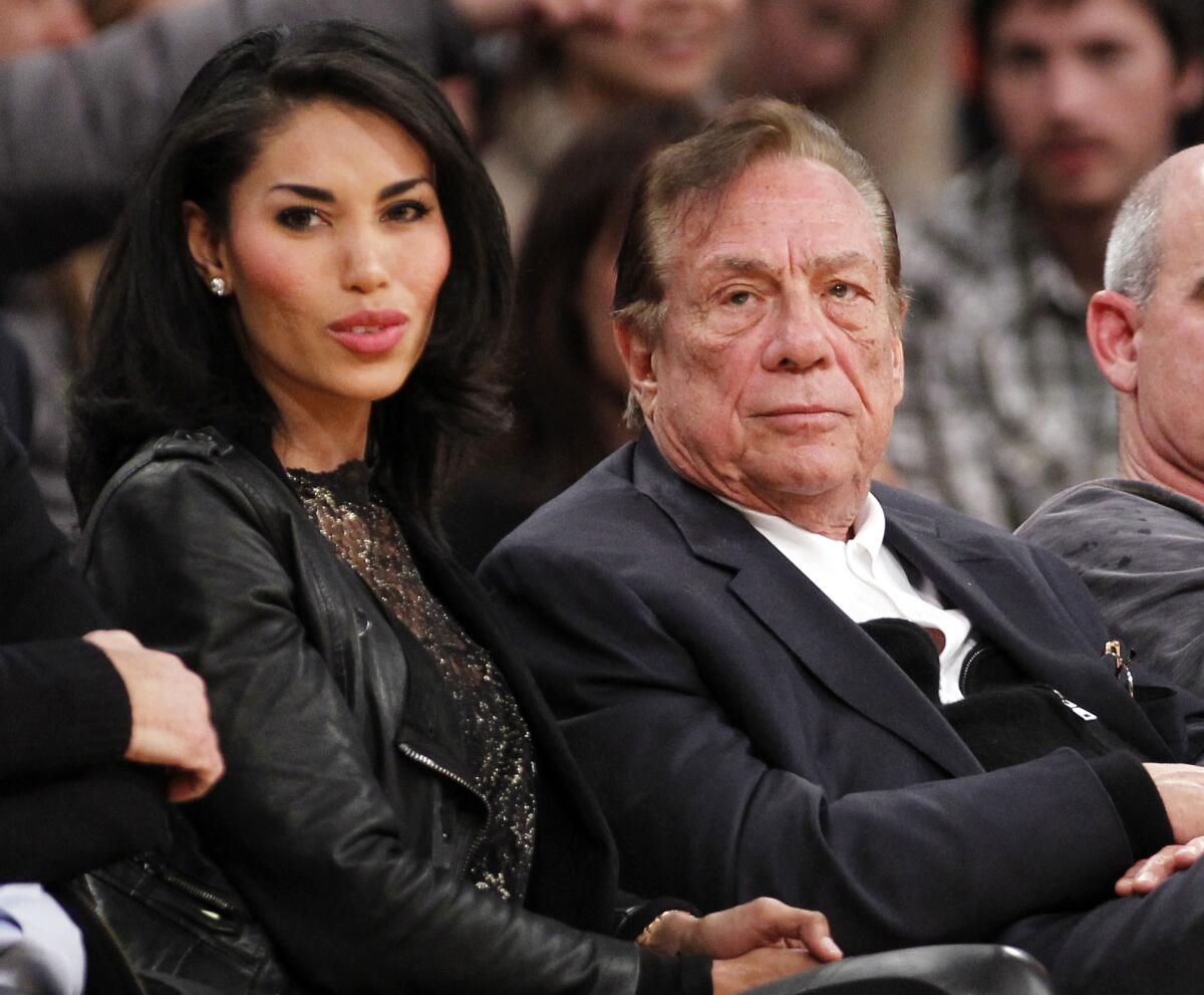 V. Stiviano and Donald Sterling watch the Clippers play in 2010.