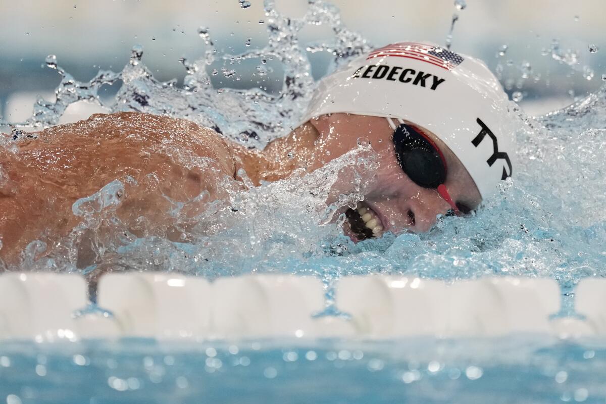 American Katie Ledecky swims in an 800-meter freestyle heat at the Paris Olympics on Friday.