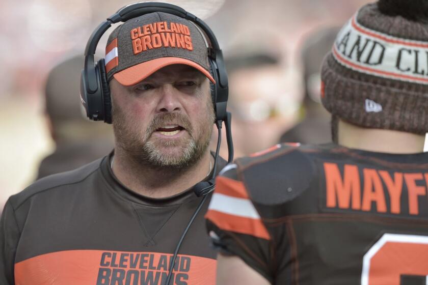 FILE - In this Nov. 4, 2018, file photo, Cleveland Browns offensive coordinator Freddie Kitchens talks to quarterback Baker Mayfield during an NFL football game against the Kansas City Chiefs, in Cleveland. A person familiar with the decision says the Cleveland Browns are hiring Freddie Kitchens as their coach. Kitchens, who had a dazzling eight-week run as the teams interim offensive coordinator, is finalizing his contract and will be named Clevelands ninth coach since 1999, said the person who spoke Wednesday, Jan. 9, 2019, to the Associated Press on condition of anonymity because the team is not commenting on the imminent hire. (AP Photo/David Richard, File)