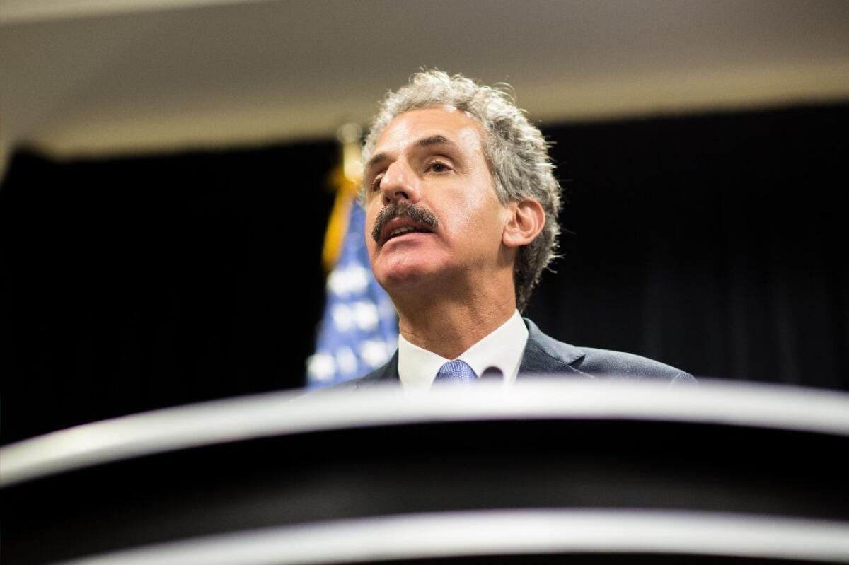 Los Angeles City Atty. Mike Feuer speaks to the media during the inaugural National Prosecutorial Summit in Atlanta on Oct. 21.