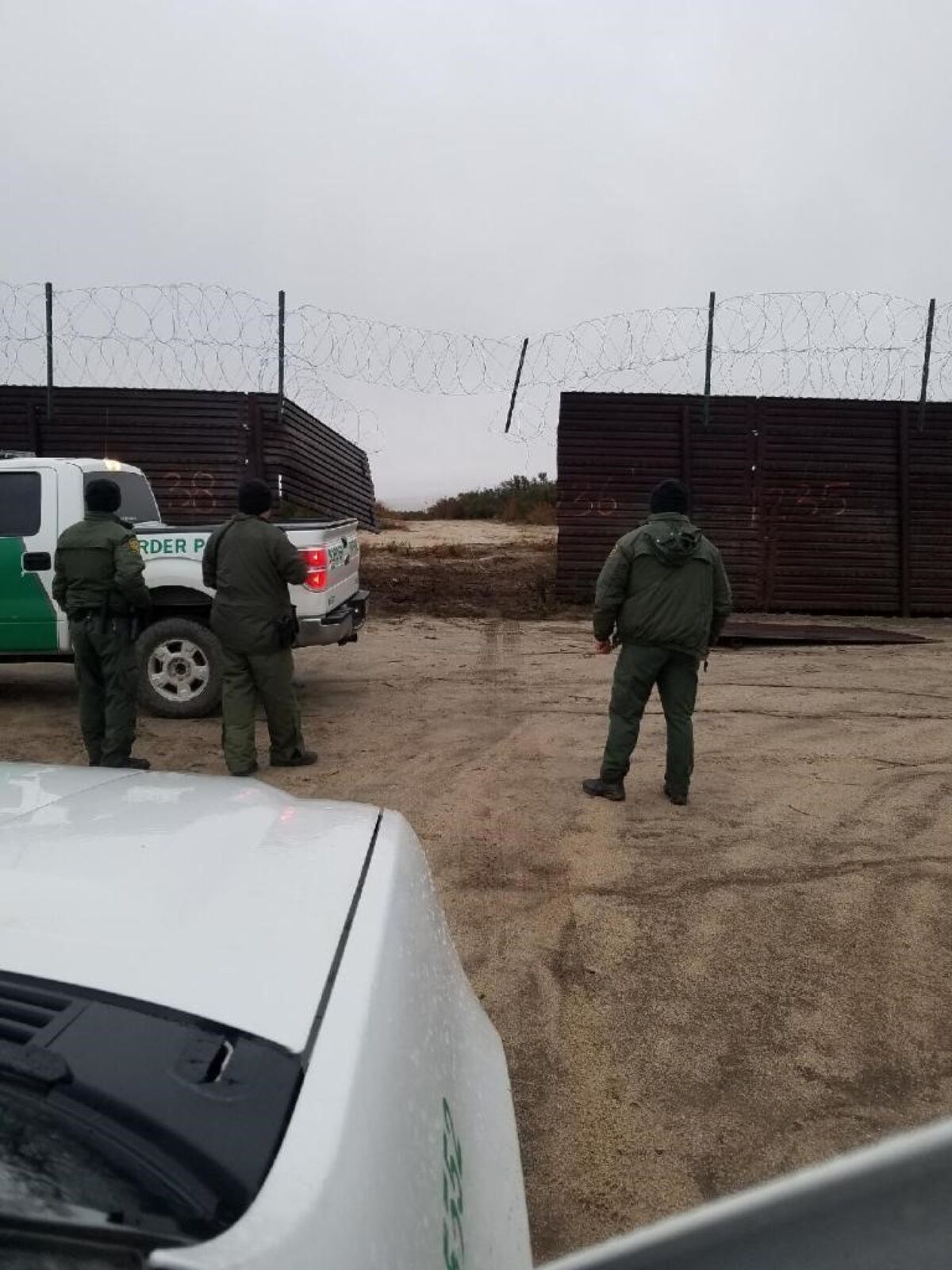 Border Patrol agents said smugglers cut through a border wall near Campo made of old landing mats and drove a stolen truck into the U.S. on Wednesday afternoon. Sixteen people were arrested.