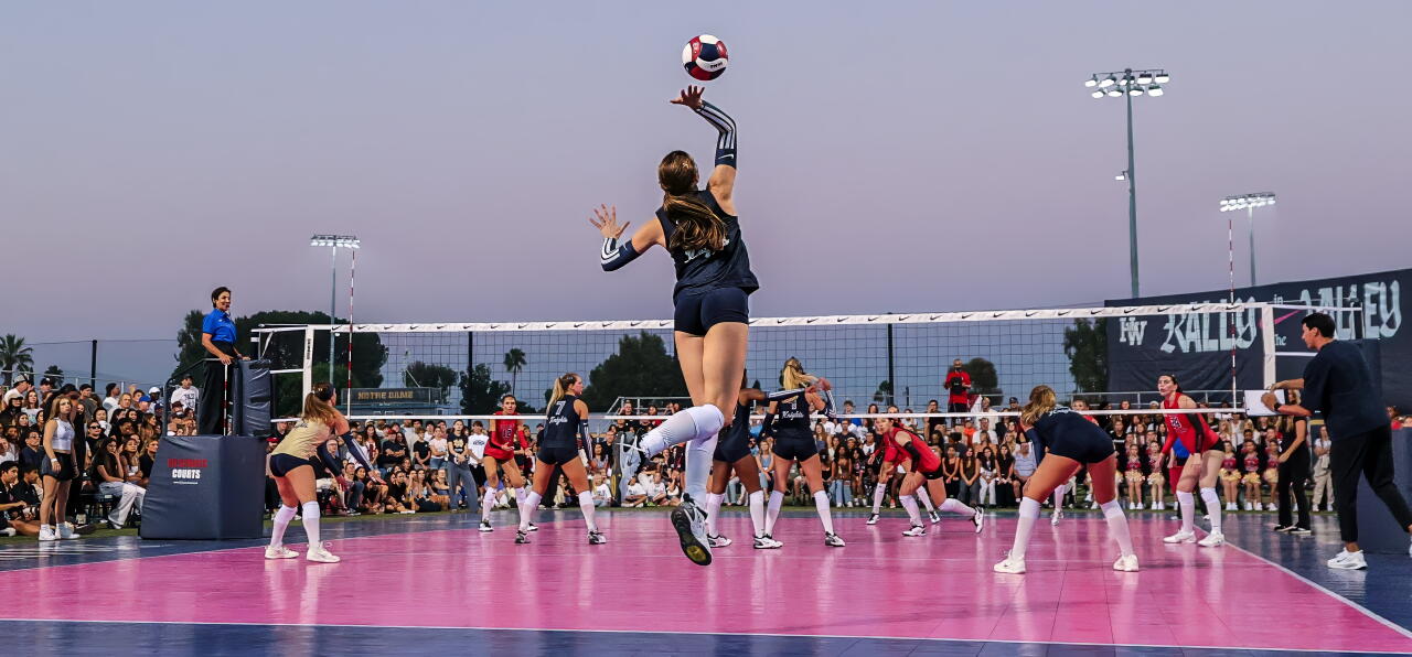 Over 1,000 fans gathered Saturday for an outdoor girls’ volleyball match at Sherman Oaks Notre Dame on the baseball field.