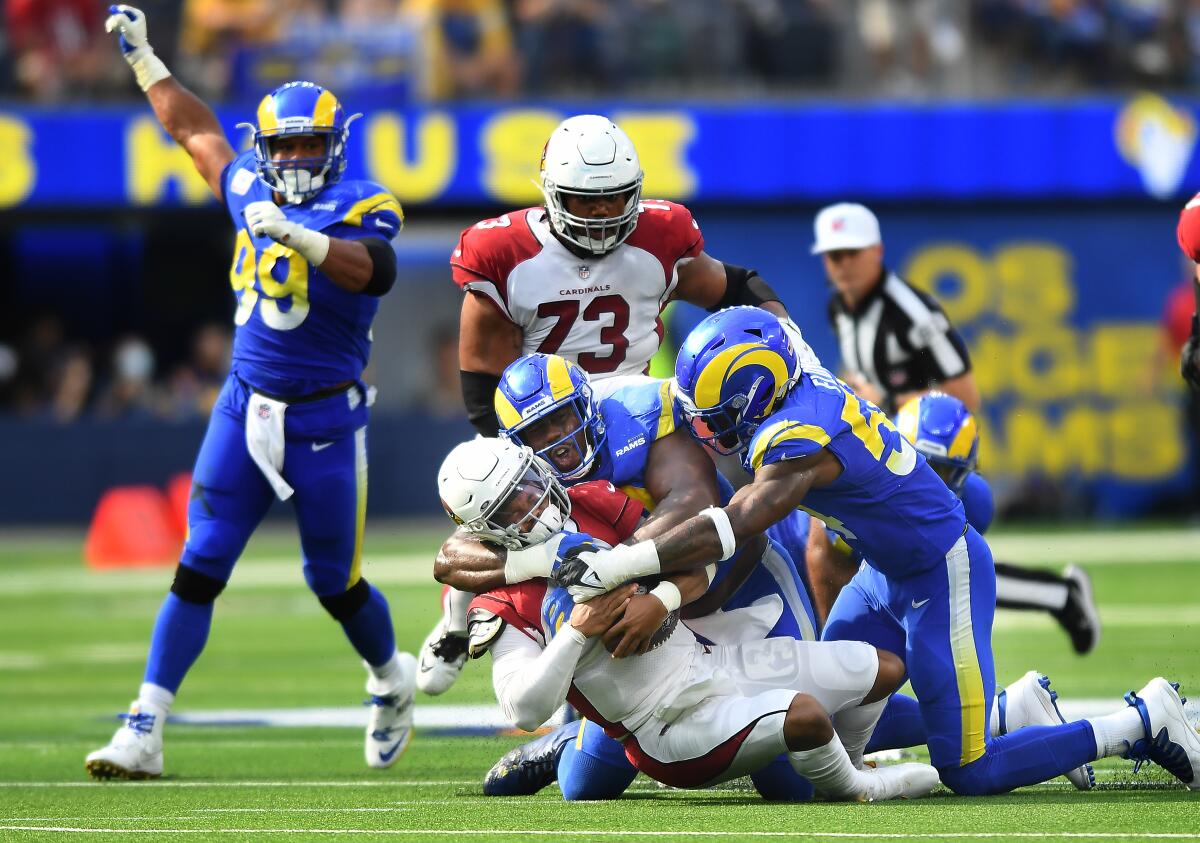 The Rams' Sebastian Joseph-Day sacks Cardinals quarterback Kyler Murray.