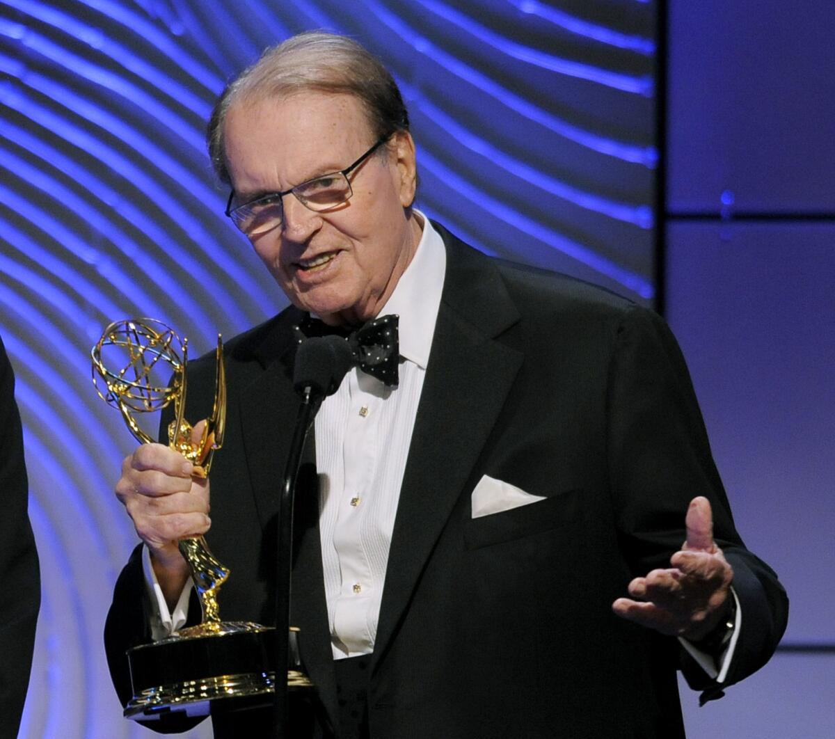 Charles Osgood accepts the award for outstanding morning program for "CBS Sunday Morning" at the 2013 Daytime Emmy Awards.
