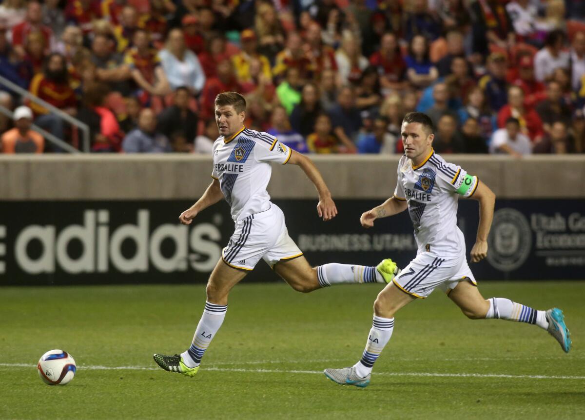 Galaxy midfielder Steven Gerrard and forward Robbie Keane (7) attack down the field during the first half of a Sept. 19 match.