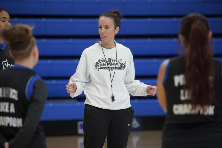 San Diego, California - March 22: Cal State San Marcos' women's basketball team practices at the Sports Center on campus before leaving Friday for the NCAA Division II Elite Eight. Coach Renee Jimenez speaks to the team in San Marcos on Friday, March 22, 2024 in San Diego, California. (Alejandro Tamayo / The San Diego Union-Tribune)