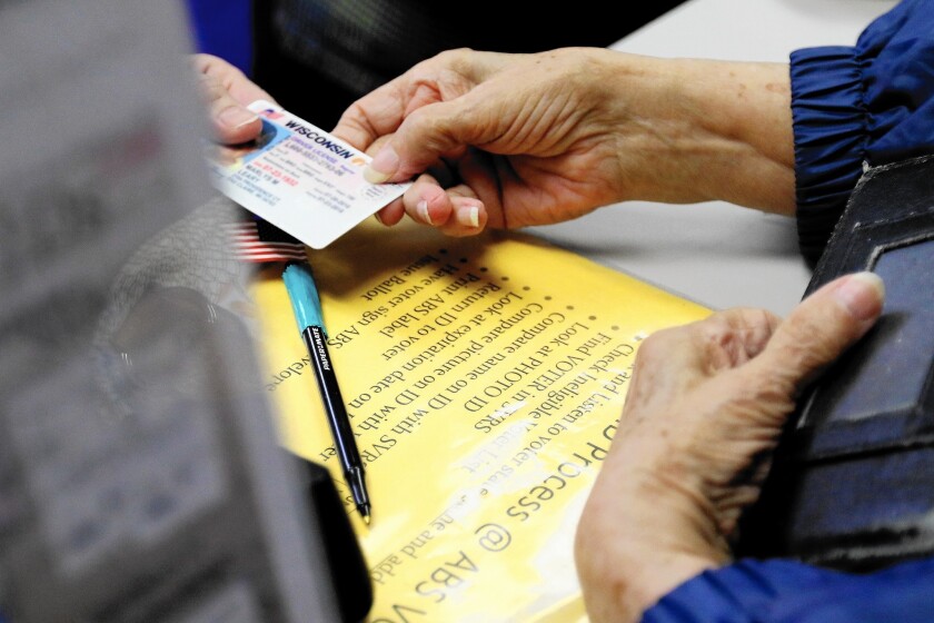 Are Voter Id Laws The Next Hanging Chads Los Angeles Times