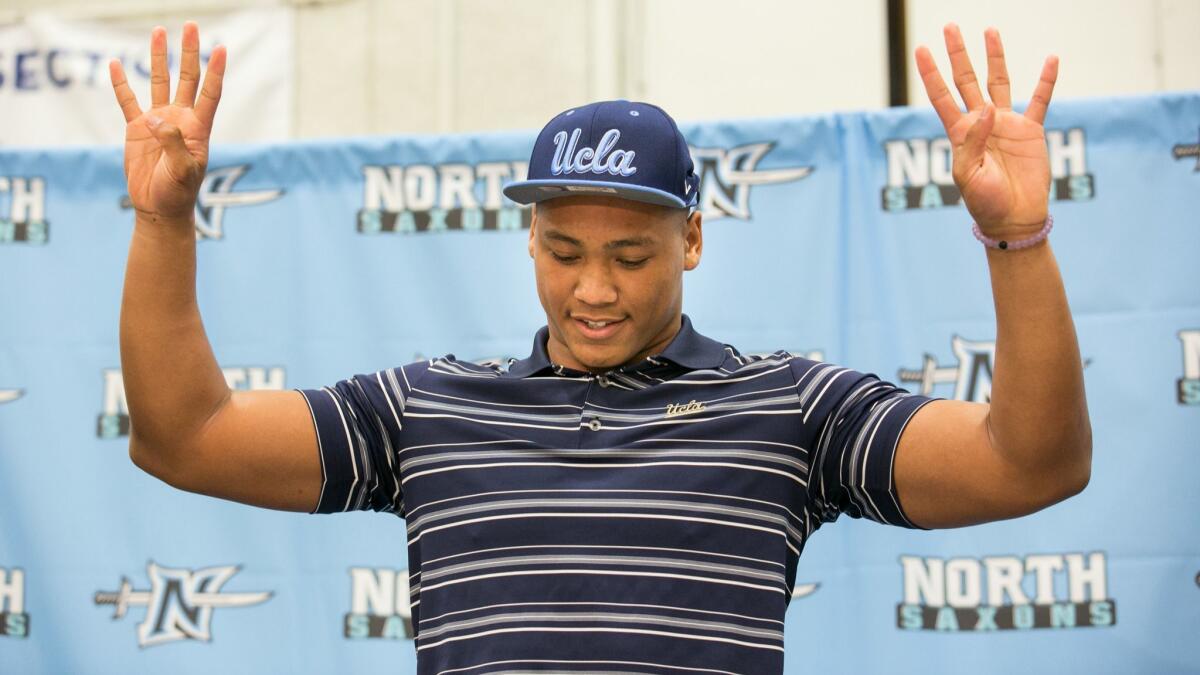 Mique Juarez commits to UCLA during national signing day at North Torrance High on Feb. 3, 2016.