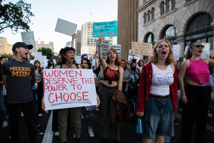 San Diego, CA - May 04: Demonstrators rally in downtown San Diego on May 4, 2022, against the leaked Supreme Court draft decision that could overturn Roe v. Wade. (Adriana Heldiz / The San Diego Union-Tribune)