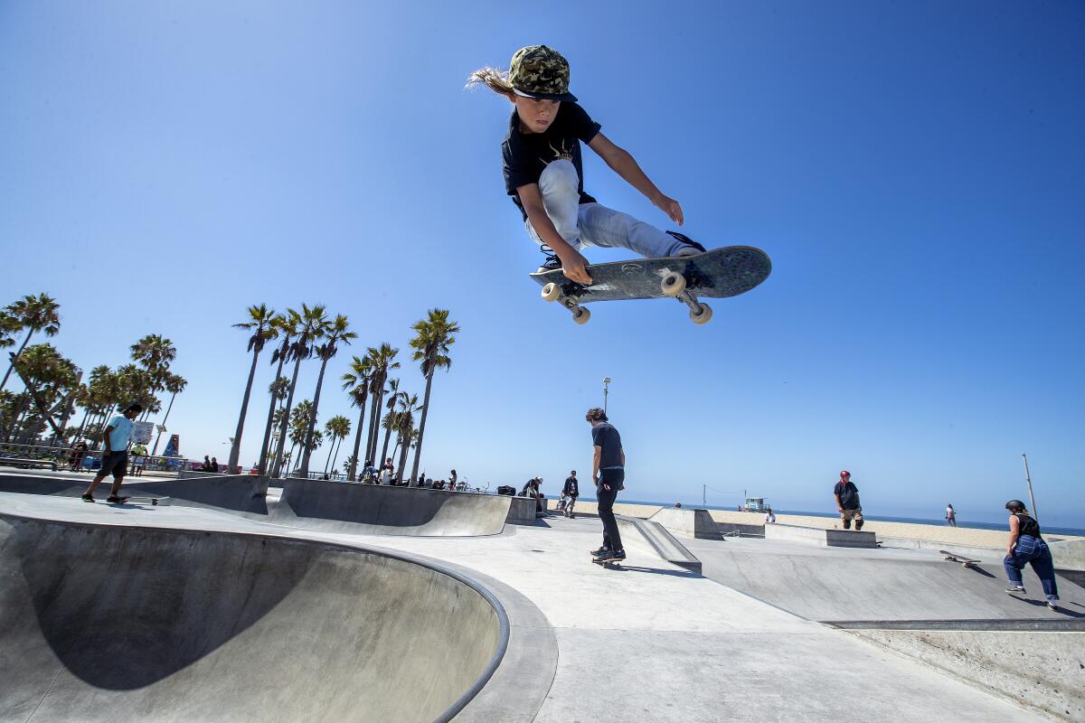Ocean Brown, 8, of Huntington Beach, gets airborne at the Venice Beach Skate Park. 