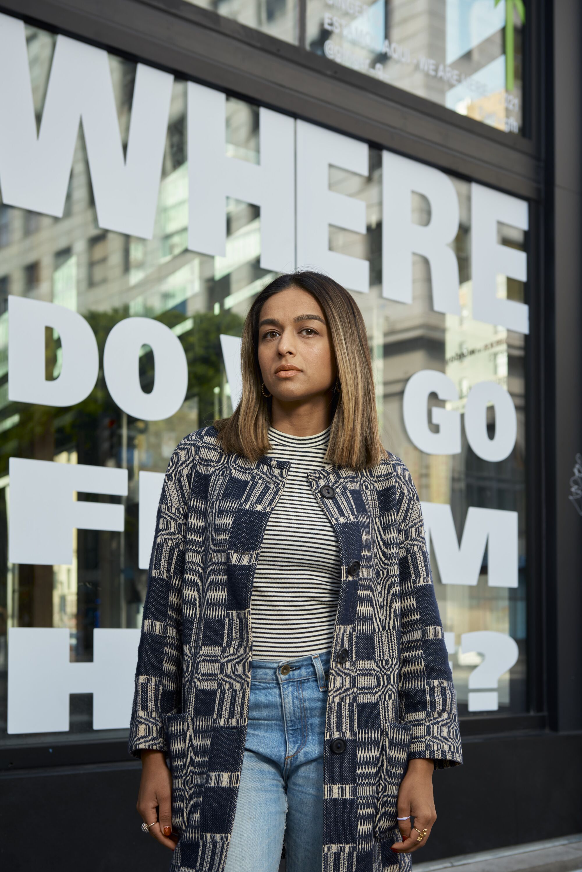 Zehra Ahmed, curator of Womxn in Windows, photographed outside the building of the exhibition in Downtown L.A.