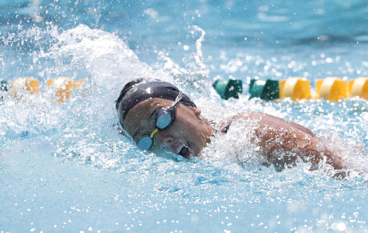 Lexi Parness of Laguna Beach heads for the finish line in the girls' 200 free during the Wave League swim finals.