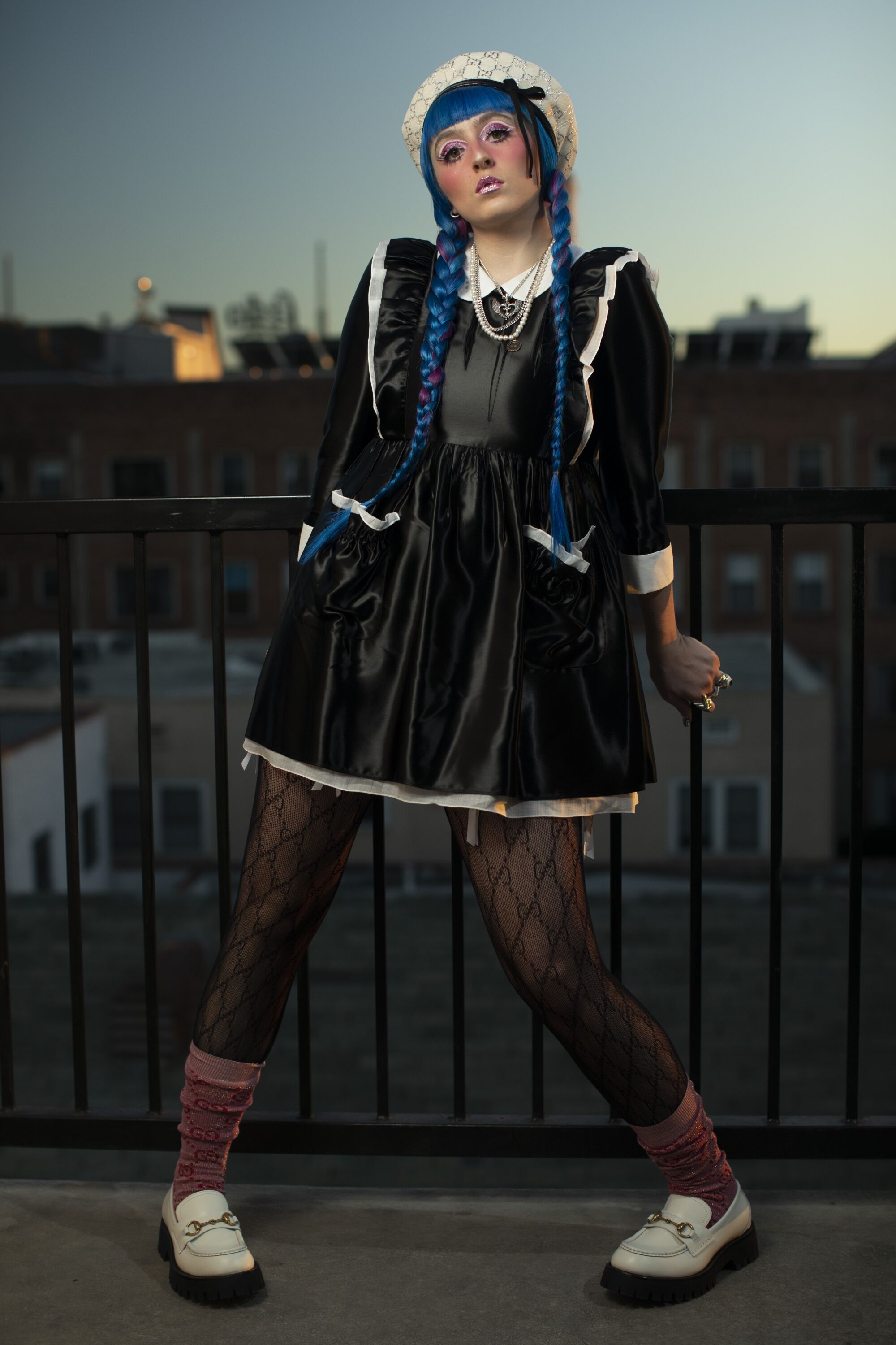 Jan. 14: American rapper Ashnikko, 24, in blue braids, a white cap and a short black silky dress and stockings