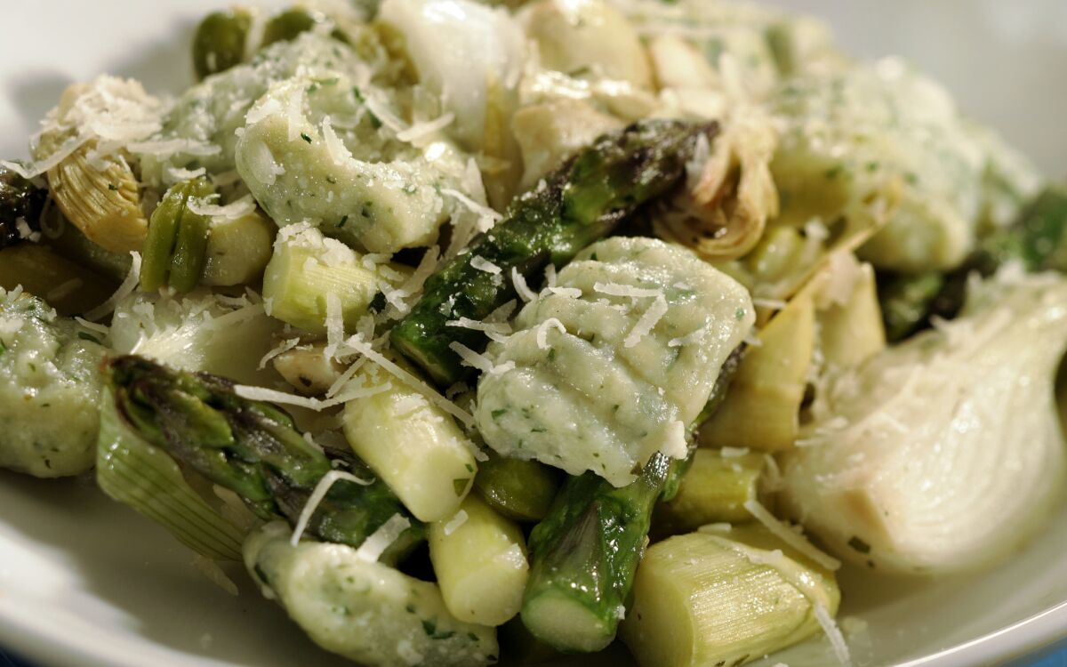 Spring vegetable stew with herbed ricotta gnocchi