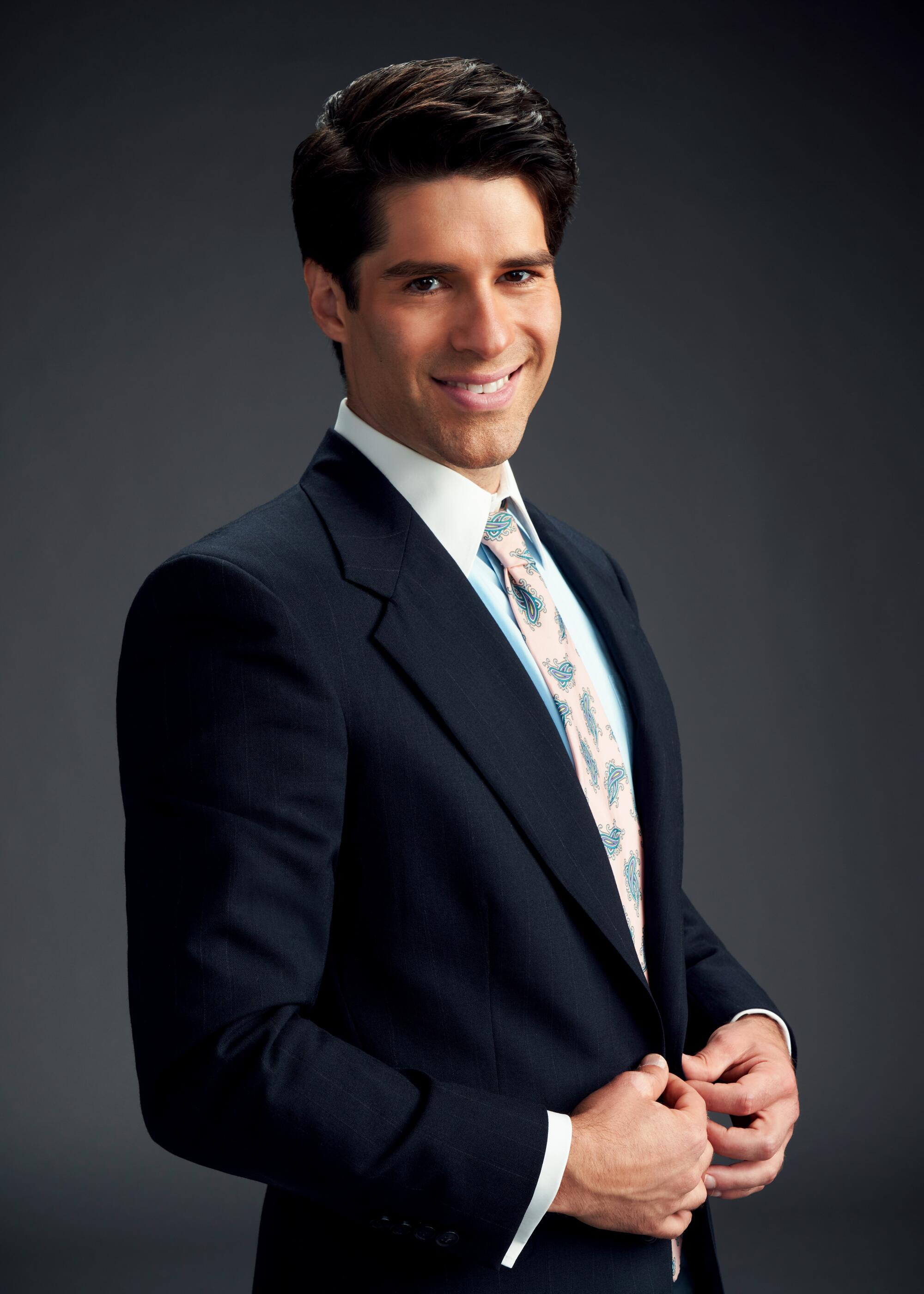 Asher Grodman as Trevor, wears a suit ... on top anyway