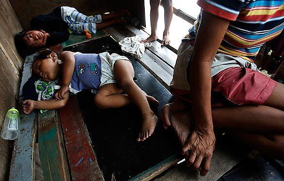 Precarious existence on Malabon River