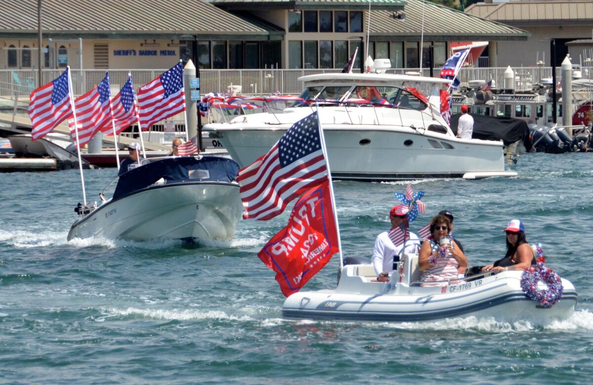 Boats of all sizes were part of the Trumptilla parade Sunday in Newport Harbor.