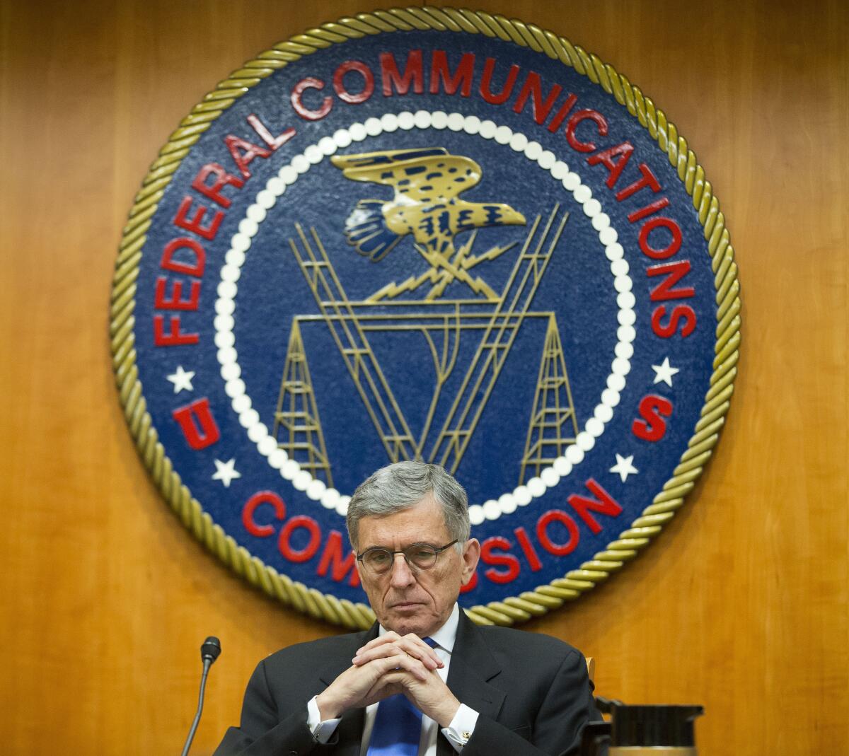 Federal Communications Commission Chairman Tom Wheeler pauses during a meeting in Washington on Feb. 26, 2015.