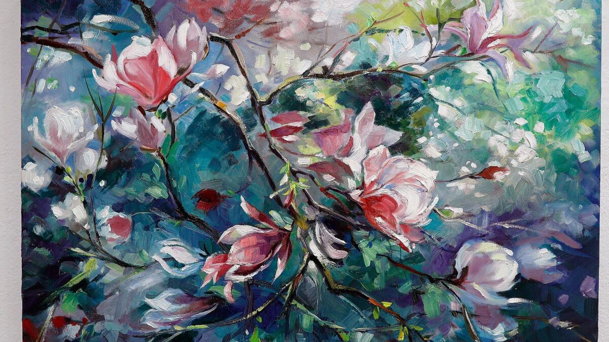A painting by Mina Ferrante called "Magnolia" hangs at the Creative Arts Center where the Burbank Art Assn. is hosting its annual fall exhibit.