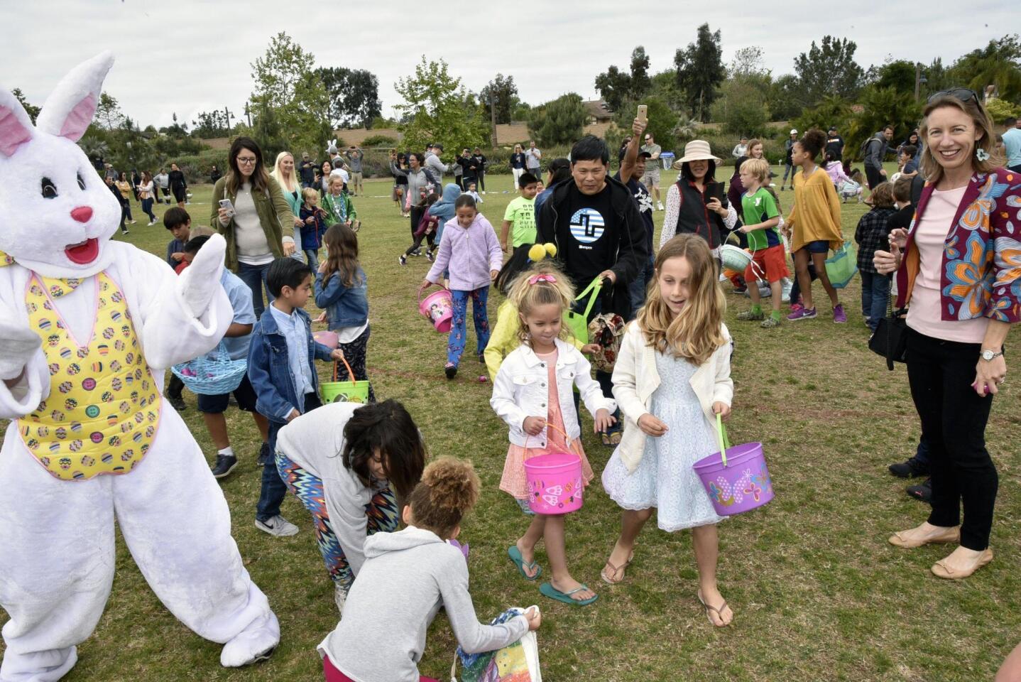 The Easter Bunny and Mayor Blakespear with egg hunters