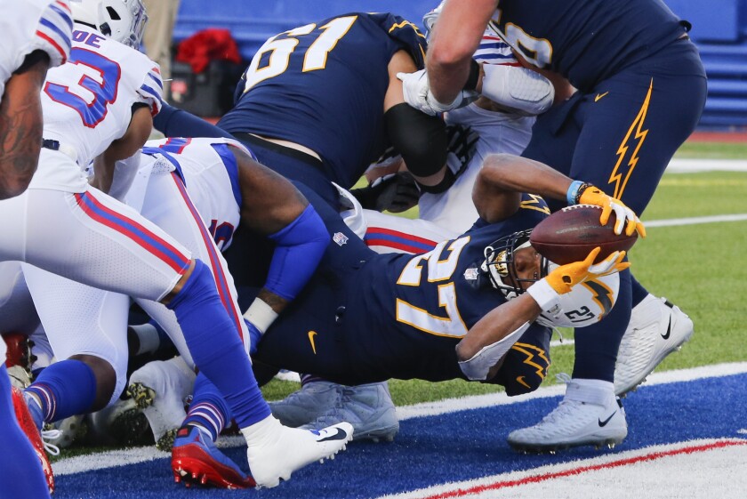 Chargers running back Josh Kelley dives into the end zone for a touchdown.