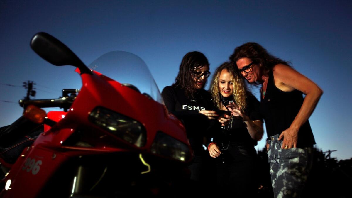 Stacie B. London, Kristin Rademacher and Martell Rose, members of the East Side Moto Babes, prepare to depart on a Los Angeles ride in 2016. They represent a growing trend of women interested in motorcycle riding.