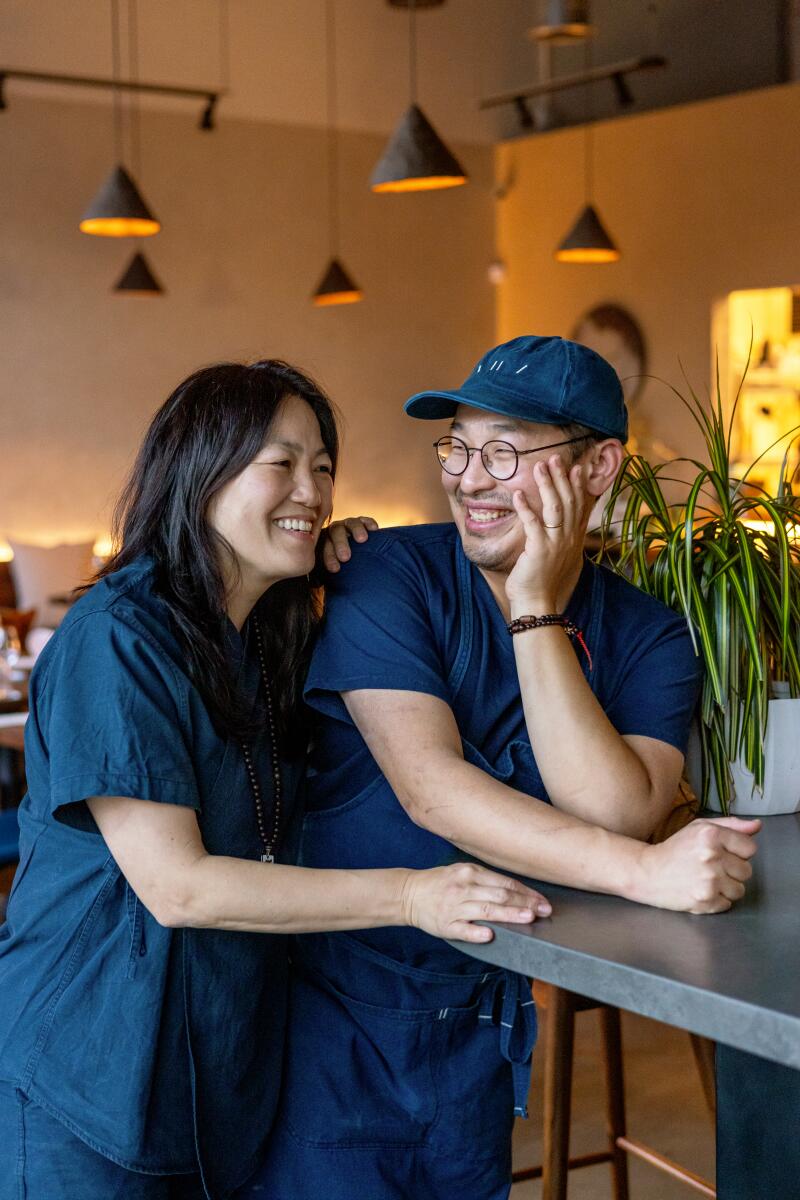 LOS ANGELES, CA - JANUARY 16, 2024: Baroo owners chef Kwang Uh, right, and Mina Park at their modern Korean restaurant