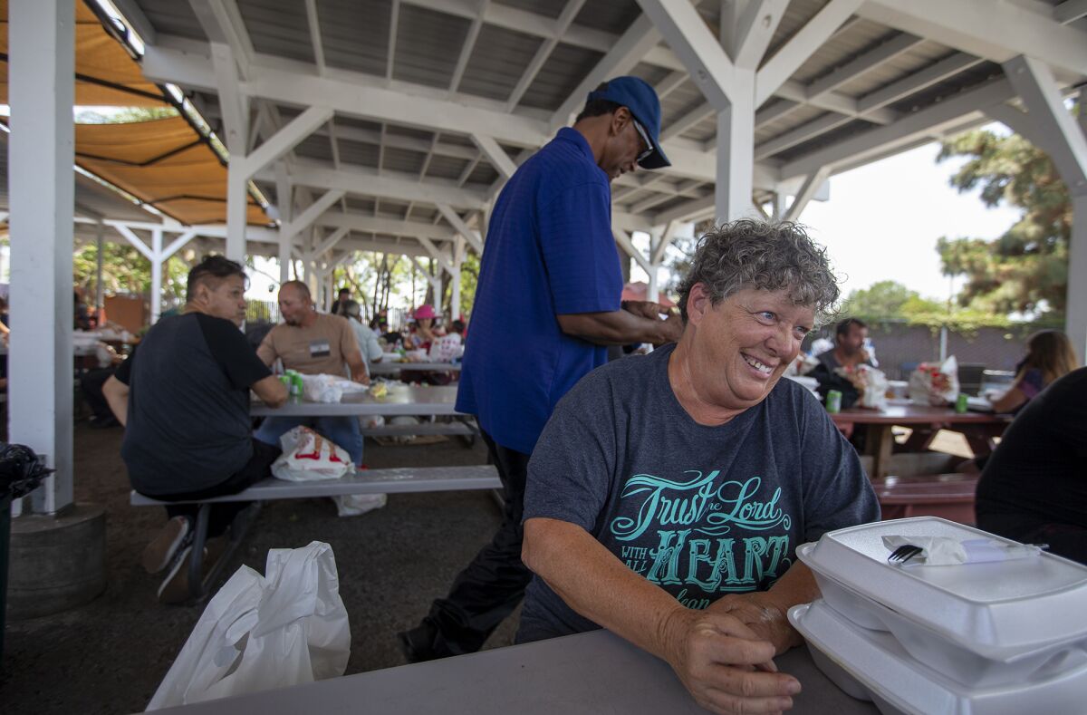 Starla Acosta, 65, has lunch at Mary's Kitchen in Orange on Tuesday, July 13.