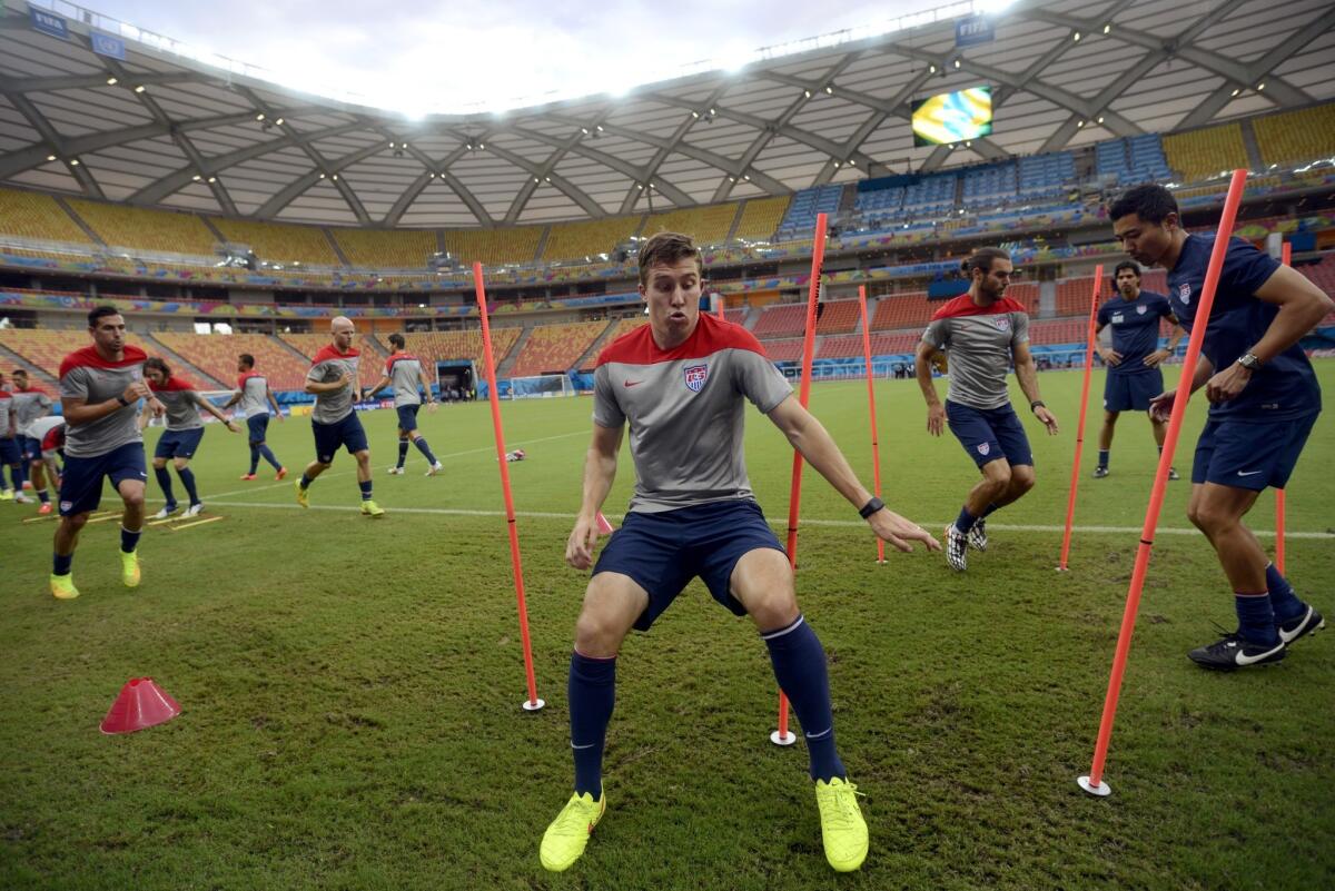 U.S. defender Matt Besler works out during a training session at Arena da Amazonio in Manaus, Brazil ahead of his team's Sunday match against Portugal.