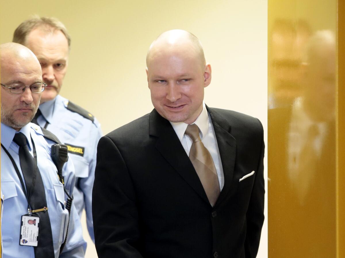 Anders Behring Breivik enters a courtroom in Skien, Norway, on March 15. He killed 77 people in a bomb and gun massacre in 2011.