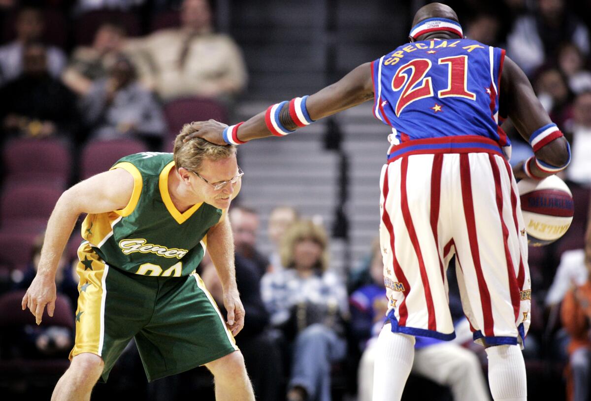 Globetrotter Kevin "Special K" Daley keeps columnist at arm's length.