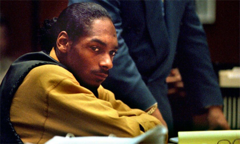 MUSIC ON TRIAL: As rap star Snoop Doggy Dogg, above, heads to court to face charges of murder, rap will also be on trial.
