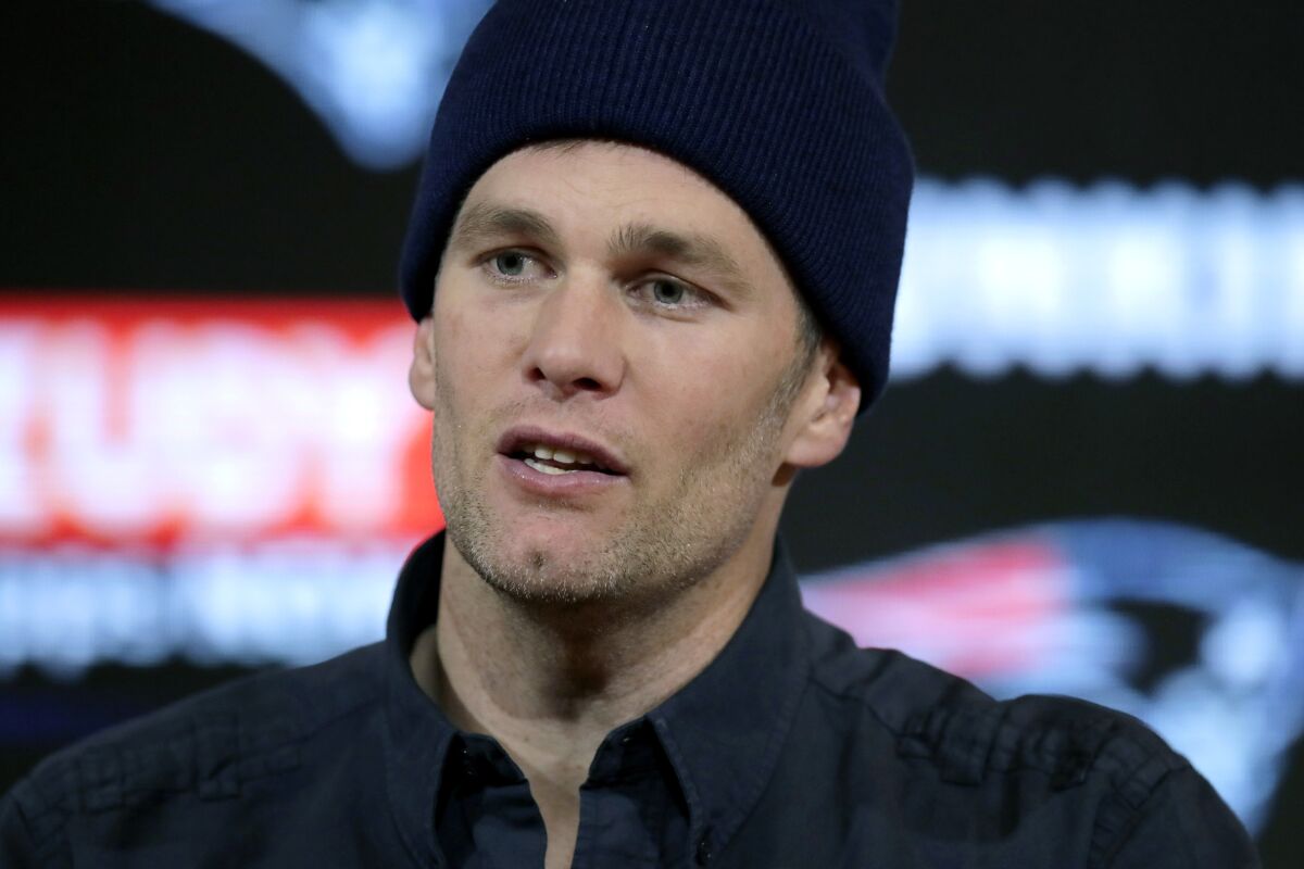 FILE - In this Jan. 4, 2020, file photo, New England Patriots quarterback Tom Brady speaks to the media