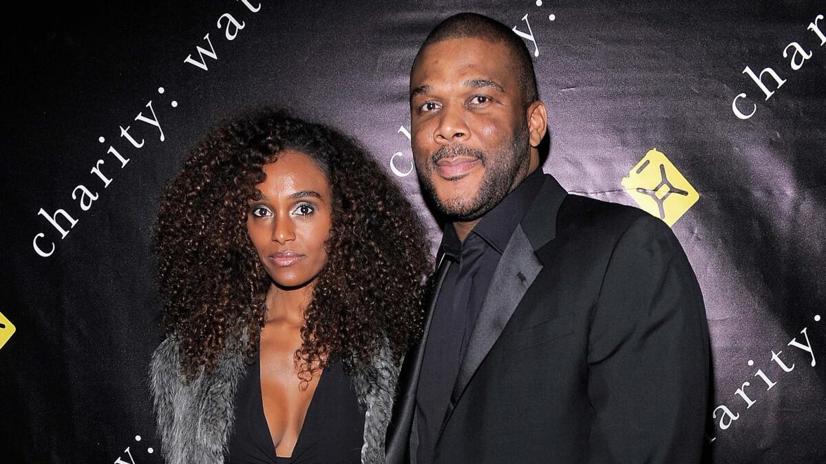 Gelila Bekele and Tyler Perry, seen at an event in December 2011, are reportedly expecting a child together.