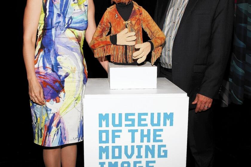 John Henson, son of Muppets creator Jim Henson, with his sister Cheryl in 2013; John Henson died Friday at 48.